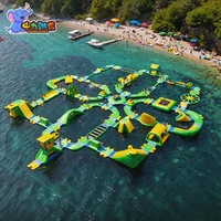 Parc aquatique gonflable géant avec toboggan, trampoline, parc aquatique flottant modulaire, parcours d'obstacles pour lac et mer