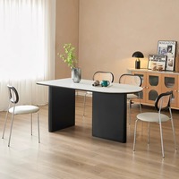 Table à manger ovale noire de style moderne du milieu du siècle avec structure en métal et plateau en ardoise, ensemble de chaises pour salon, 4 places
