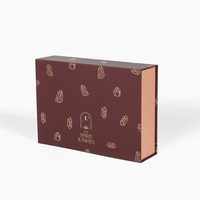 Boîte de luxe personnalisée en forme de livre rigide, imprimée numériquement, motif graffiti brun-rougeâtre, avec compartiments en chocolat et doublure en éponge, pour aliments pour bébés