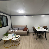 Maison conteneur extensible à double aile 20FT/40FT, pliable, de luxe, portable et moderne avec salon et cuisine