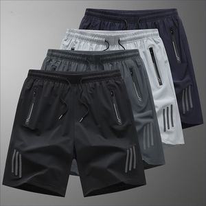 Men's Quick Dry Sport Shorts With Zip Pockets Elastic Waist Solid Color Mid Rise Knitted Polyester - Product Image 1