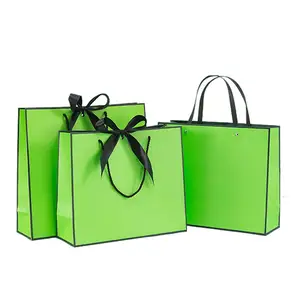 Özel baskılı hediye alışveriş lüks kağıt torba düğün hediye ambalaj kağıt torba ile özel Logo kolu şerit