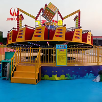 Manège tournant en acier durable et PRV pour parcs d'attractions et fêtes foraines en extérieur, idéal pour les entreprises