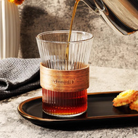 Tasse à latte en verre transparent haut de gamme tasse à café de style américain avec mousse de lait conception de fleurs modernes article ménager populaire Ins