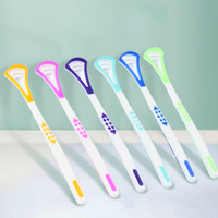 Grattoir à langue en silicone et plastique avec design multifonctionnel double face écologique pour usage domestique