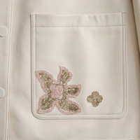 Veste en peau de mouton pour femme, col chemise ivoire, broderie florale perlée, fermeture à boutons-pression, coupe ample, courte, décontractée, en cuir