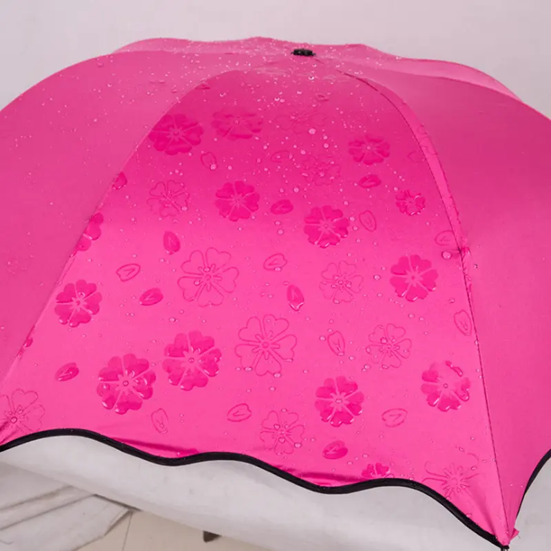 雨と太陽の3つ折り反転傘プレゼント用の濡れた傘を手に入れるときの花