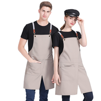 Nouvelle conception Tablier de travail sans manches en toile à bretelles avec ourlet fendu pour le nail art, la beauté, la peinture, les restaurants occidentaux, les cafés, durable