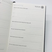 Carnet en cuir noir 2023 avec logo en relief et bande élastique journal de remerciement