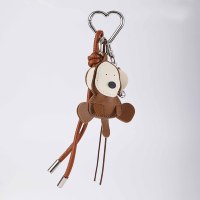 Porte-clés animalier OEM en cuir PU, motif singe avec sangle tressée et breloque de sac en métal en forme de cœur