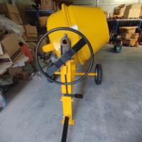 Bétonnière mobile à tambour rotatif, machine à mélanger le béton portable pour la construction routière et l'utilisation agricole