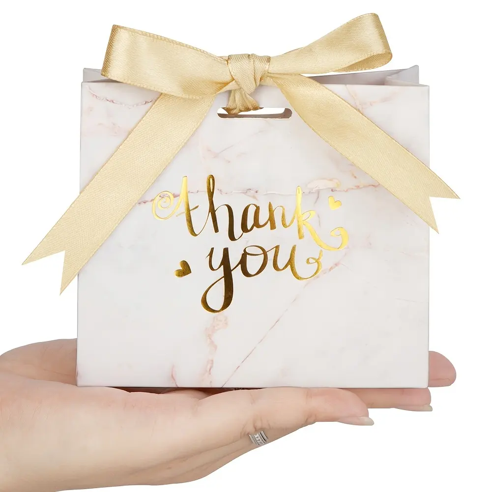 Sacchetto di imballaggio regalo piccolo in cartone bianco con manico a nastro di lusso sacchetti di carta stampati personalizzati Bolsas De Papel con il tuo Logo