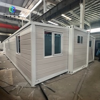 Özel OEM ODM Çift Kanatlı Genişletilebilir Konteyner Ev Toptan Modüler Prefabrik Ev Geçici Yaşam Ofis Kampı için