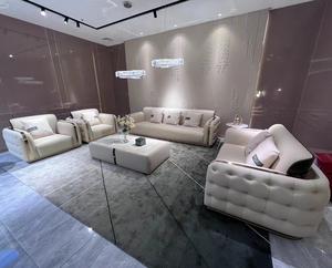 Muebles de sala de estar de lujo italianos hechos en fábrica Sofá de cuero beige con decoración de metal de acero inoxidable Juego de sofás modernos - Product Image 3