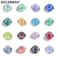 Vente en gros de zircone cubique synthétique de laboratoire 6*7mm en forme d'œil avec effet de couleur/effet feu, pierres précieuses synthétiques pour la fabrication de bijoux et le nail art DIY