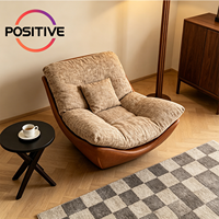 Fauteuil lounge Cloud de luxe, fauteuil d'appoint rembourré en tissu avec base en cuir ciré, mobilier moderne pour salon