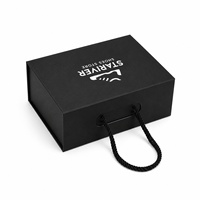 Boîte à chaussures pliable magnétique en gros, noire mate, avec logo sérigraphié, pour emballage de baskets, avec poignée robuste en corde torsadée