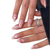 24 faux ongles roses en amande à presser avec strass et nœud, couvrance totale pour doigts