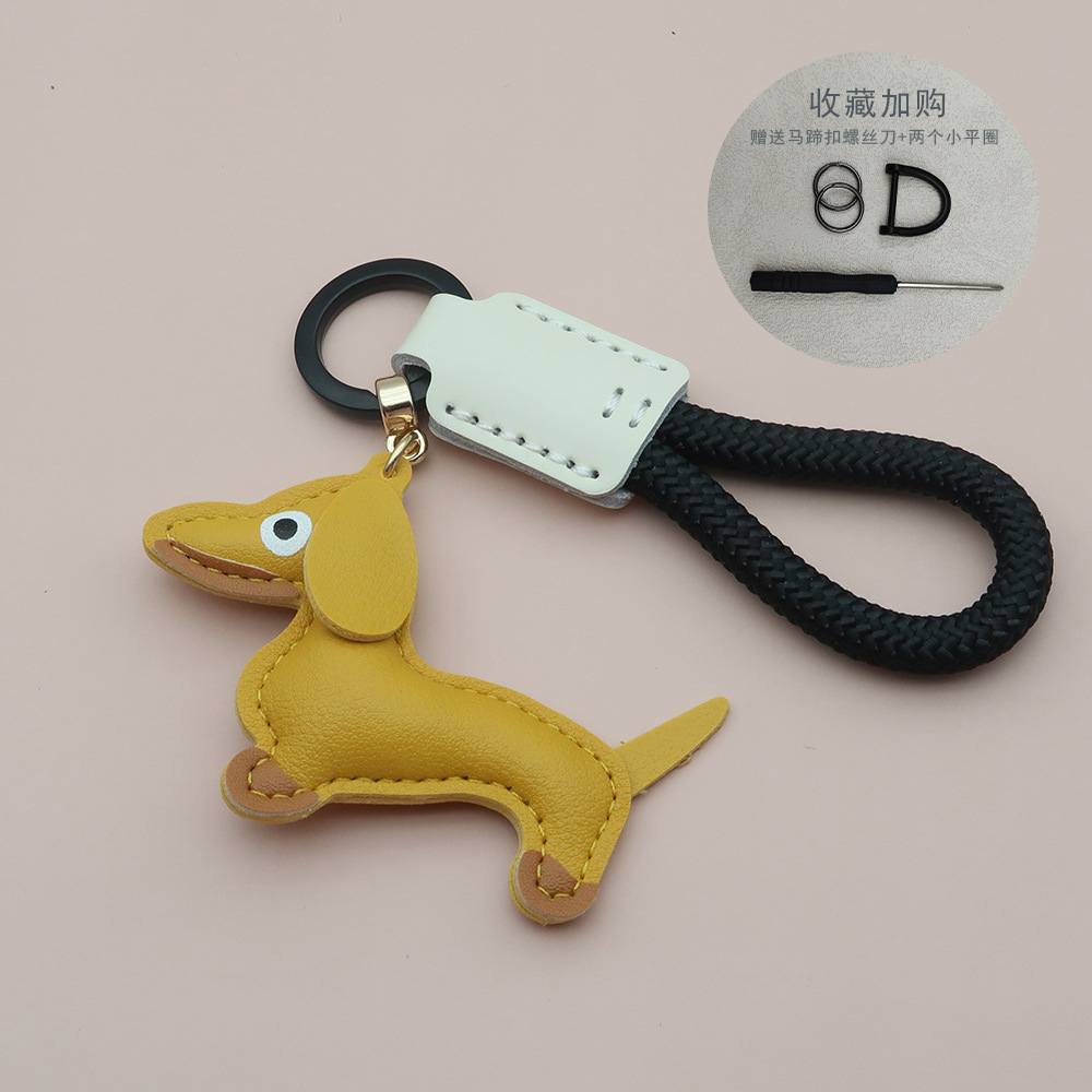 Cachorro amarillo (incluye 2 anillas planas pequeñas + hebilla en forma de D)