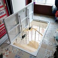 Porte de sous-sol automatique à ouverture vers le haut avec construction métallique coupe-feu, moteur robuste et trappe dissimulée pour usage en entrepôt