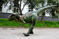 Modèle de dinosaure de simulation réaliste pour adulte Costume de dinosaure de marche électrique T-REX Modèle électronique animatronique Pixar Dinoco