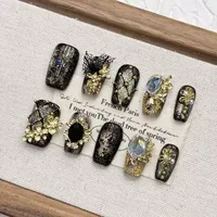 Ongles à presser gothiques faits à la main, effet œil de chat noir, forme amande, faux ongles avec accents floraux