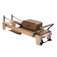 Machine professionnelle de Pilates en bois de chêne pour l'entraînement de corps Pilates Reformer Machine Home Yoga Fitness Reformer Prix usine