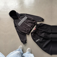 Ensemble survêtement homme personnalisé avec sweat à capuche zippé et pantalon de jogging – Tenue de sport deux pièces streetwear – Vente en gros OEM – Joggers noirs