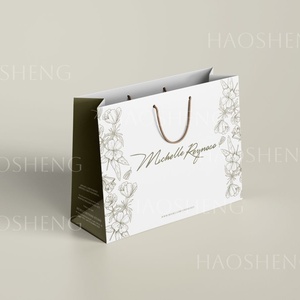 ถุงกระดาษพับได้แบบพกพา ย่อยสลายได้ สีขาว สำหรับร้านเสื้อผ้าหรูหรา บรรจุภัณฑ์สำหรับขายปลีก ถุงของขวัญ - Product Image 6