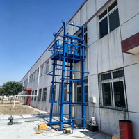 Plateforme élévatrice verticale hydraulique fiable pour le levage de marchandises stationnaires et le transport inter-étages en usine