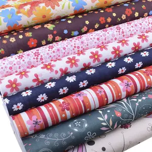 Hot Selling Colorful Christmas Style Pattern Manufacturer Embossed Non Woven Fabric
