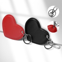 Breloque de téléphone en cuir grainé de luxe en forme de cœur, porte-clés, pendentif de sac avec fermoir en métal argenté pour cadeau de Saint-Valentin et souvenir de mariage