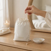 Vente en gros Sac en lin pour téléphone portable avec cordon de serrage Pochette en grains de café en jute avec logo personnalisé 10*21cm de couleur naturelle