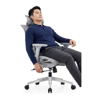 Chaise de bureau ergonomique avec support de nuque réglable, système lombaire dynamique, dossier en maille inclinable et base roulante pour salle d'étude