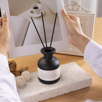 Bouteille vide de luxe de diffuseur de roseau en verre d'arôme rond noir mat de 100ml 250ml vente en gros