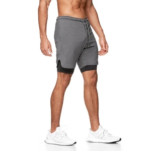 กางเกงยิมชายแบบ 2-in-1 ขนาด 5 นิ้ว พร้อมซับในรัดรูป แห้งเร็ว ระบายอากาศได้ดี ผลิตจากผ้าสแปนเด็กซ์/โพลีเอสเตอร์ เป็นมิตรต่อสิ่งแวดล้อม พร้อมโลโก้แบบกำหนดเอง - Product Image 1