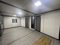 Maison conteneur pliable et extensible de 20 pieds en panneaux sandwich d'acier contemporains avec installation rapide