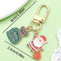 Porte-clés créatif de Noël avec effet d'huile coulante, design de dessin animé mignon, cadeau festif pour enfants et adultes