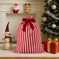Sac cadeau de Noël rayé, grand sac à cordon réutilisable en tissu avec nœud pour le rangement des cadeaux de Noël et la décoration de la maison