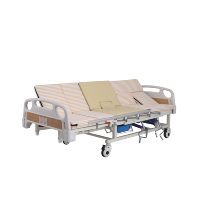 Lit d'hôpital manuel multifonctionnel avec fonctions de commode et de rotation