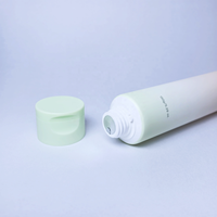 Tube d'emballage en plastique de 100 ml et 150 ml avec bouchon à clapet en forme d'arc, couleur dégradée personnalisée pour conteneur de crème