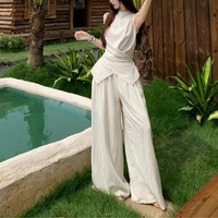 Ensemble d'été 2 pièces pour femme, style français, coupe décontractée et élégante, haut sans manches croisé et pantalon ample décontracté