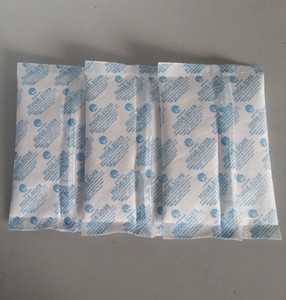 Công nghiệp cấp 50g Canxi clorua bột hút ẩm nhà sản xuất cung cấp tỷ lệ hấp thụ độ ẩm 300% kiểm soát độ ẩm - Product Image 1