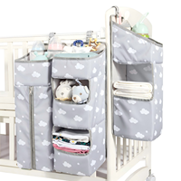 Organisateur de couches suspendu 3-en-1 pour table à langer, organisation de la chambre d'enfant et rangement mural pour couches de berceau