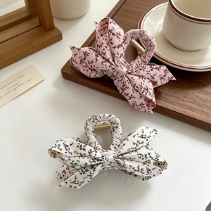 Korean style small floral fabric wrap-around crisscross hair <b>clip</b>, a popular and simple hair accessory for updos. - Product Image 2
