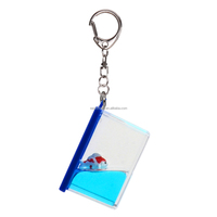 OEM ODM Vente chaude Porte-clés liquide en acrylique cube d'eau personnalisé et créatif avec paillettes et séquins, effet sable mouvant aquatique, souvenir cadeau
