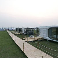 Capsule spatiale en structure acier préfabriquée mobile pour famille, modèle 2026, fabriquée en Chine, avec cuisine et salle de bain, appartement écologique au design moderne
