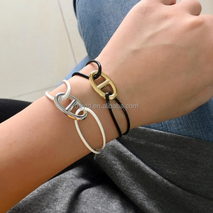 <span class=keywords><strong>Bracelet</strong></span> d'Amitié Ajustable Personnalisé en Cordon <span class=keywords><strong>Maille</strong></span> <span class=keywords><strong>Marine</strong></span> avec Charme en Acier Inoxydable, Bijou Nautique Porte-Bonheur pour Surfeur et Marin - Product Image 1