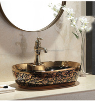 Nouveau modèle de bassin de style Céramique Placage doré Salle de bain Évier couleur or noir