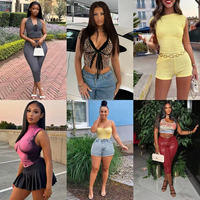 Vente en gros de vêtements en grandes quantités : pantalons et robes de marque, neufs, emballés, expédition aléatoire, assortiment varié, fournisseur de vêtements en stock